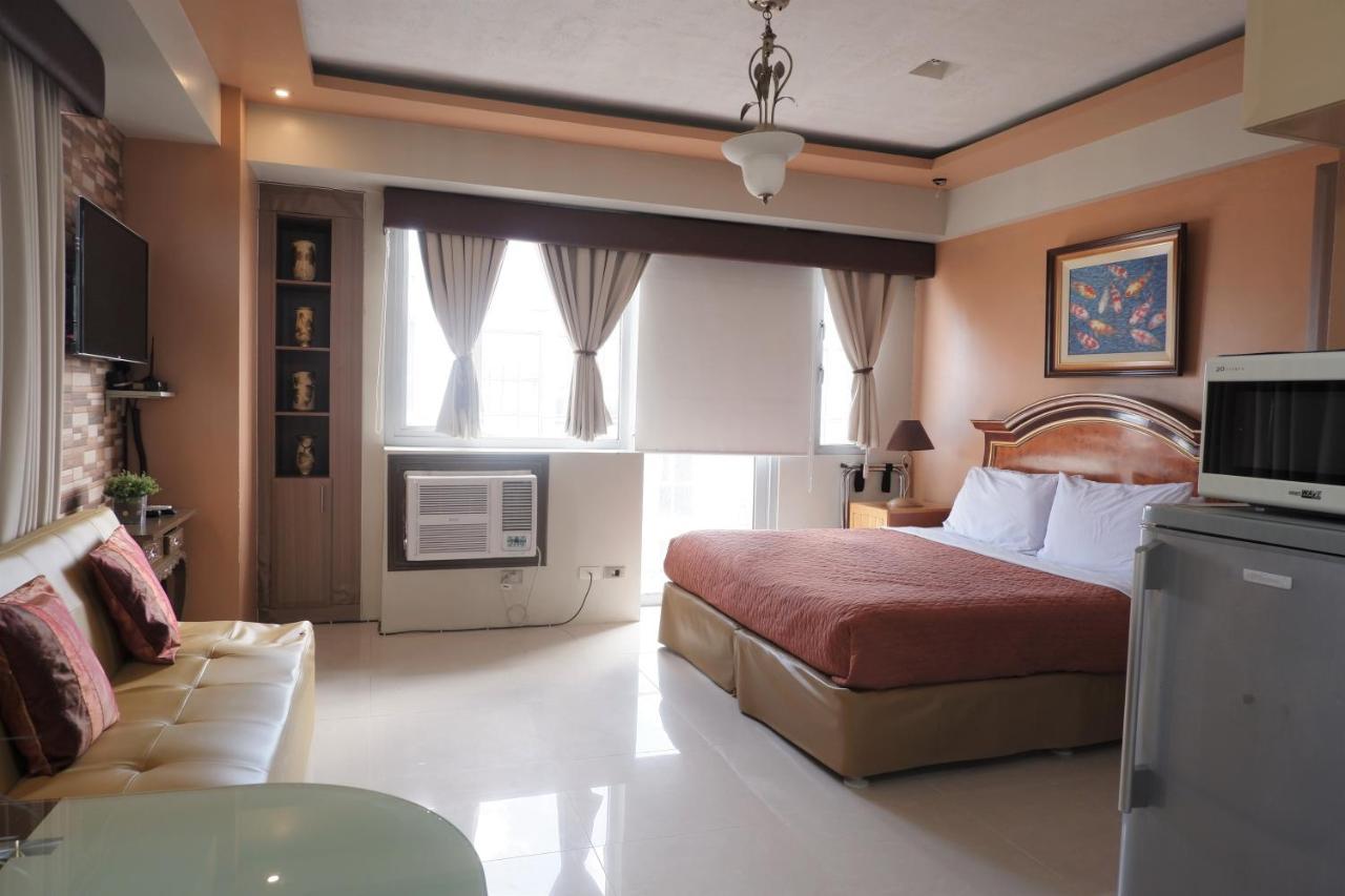 One Palm Tree Villas Manila Exteriör bild