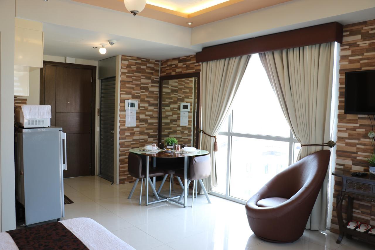 One Palm Tree Villas Manila Exteriör bild